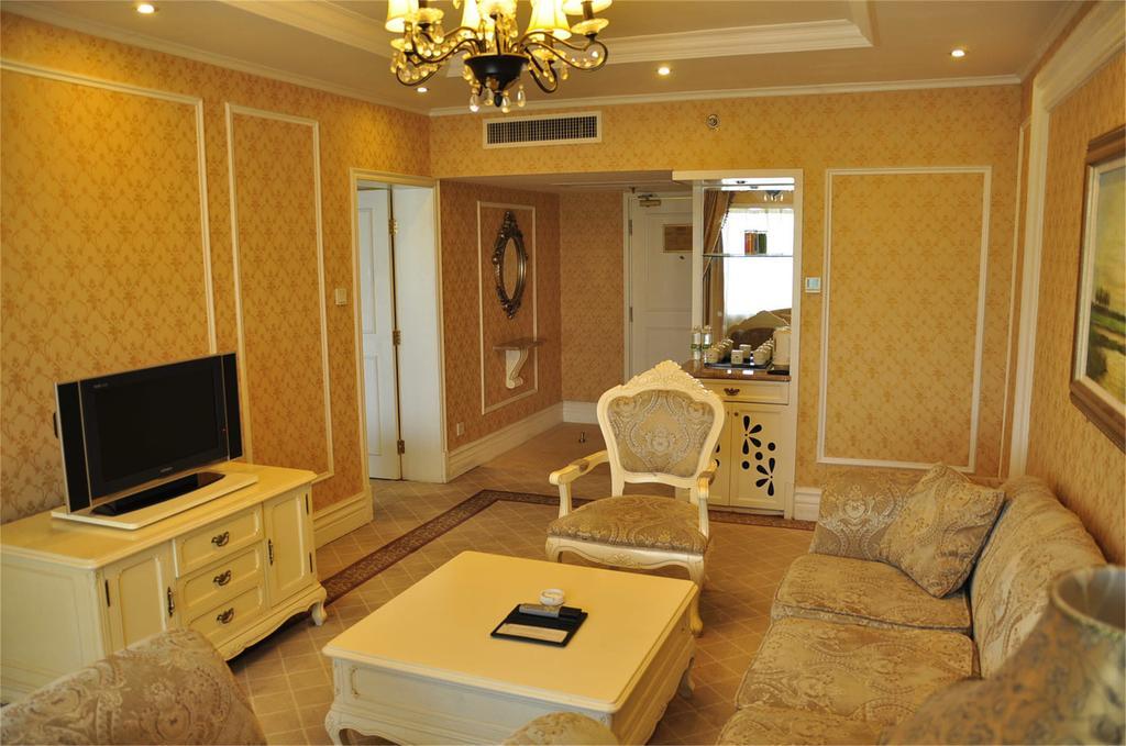 Geneva Hotel Тяньцзинь Номер фото